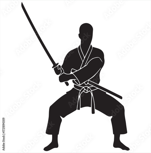Silhouette of a martial artist in a fighting stance with a katana sword martial arts warrior