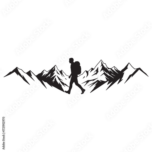 Hiker silhouette against a mountain range landscape