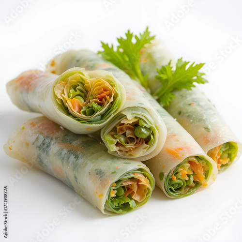 Fresh vegetable spring rolls isolated on a white background, showcasing crisp rice paper filled with vibrant.