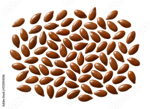 Scattered brown flax seeds from a top view.