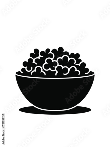 Black silhouette of a bowl filled with popcorn on a white background