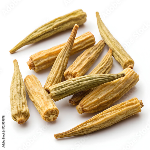 Dried drumstick vegetable pieces, also known as Moringa, isolated on a white background; commonly used