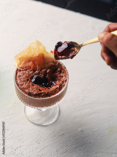 Chocolate Mousse with Dark Berry Sauce and Sugar Tuile