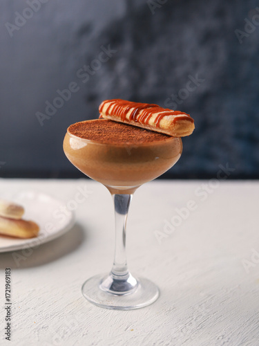 Elegant Tiramisu Inspired Cocktail with Wafer Garnish