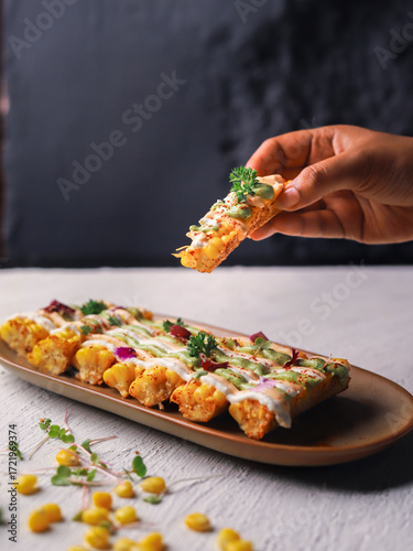 Loaded Corn Ribs with Cheese Sauce and Fresh Herbs