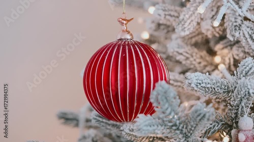 Christmas ornament red glass bauble glitter frost, pine branches lights, holiday decoration detail, New Year celebration mood, cozy festive atmosphere, sparkling winter background, seasonal spirit