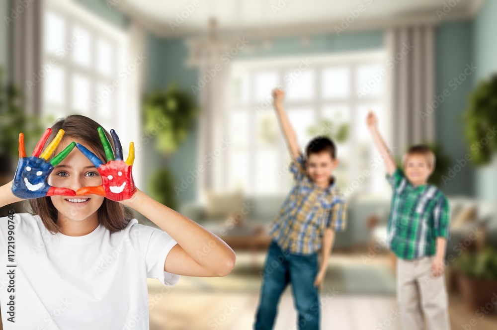Fototapeta premium Little girl showing painted colorful hands