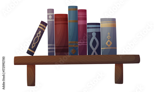 Bookshelf with a collection of colorful books on a wooden shelf