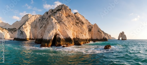 Ocean waves crash against rocky cliffs coastal landscape scenic view