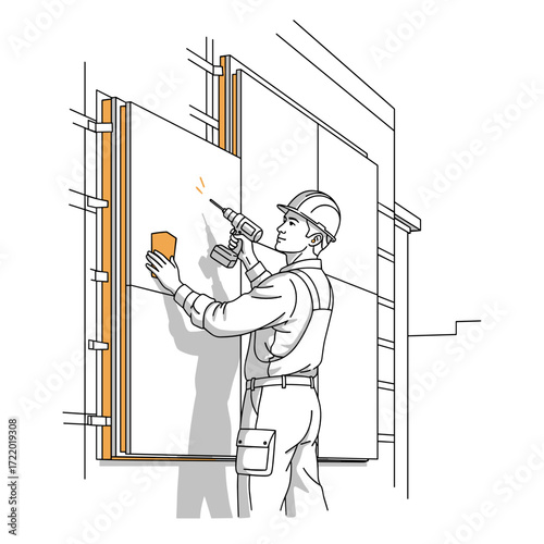 Construction worker installing panels on a wall