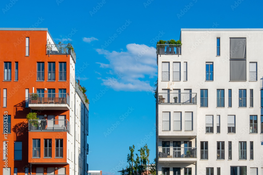 Naklejka premium Modern New apartment building fragments urban residential area windows balconies architecture apartments urban housing blue sky real estate investment exterior, property development