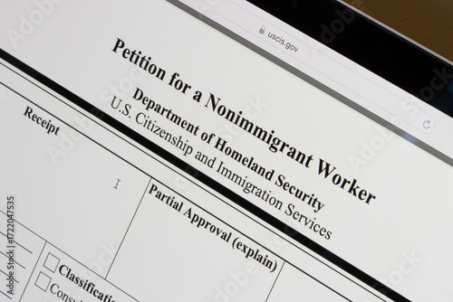 Form I-129, Petition for a Nonimmigrant Worker, is seen from the website of U.S. Citizenship and Immigration Services (USCIS) on the screen of a computer.