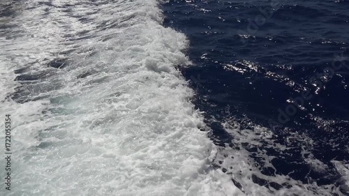Shooting with Wake of a Boat in a Holliday Trip on Mediterranean Sea. Blue Sea Waves back on a trip boat.