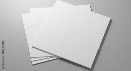 Clean & Minimalist Stack of Blank White Square Papers on Neutral Background