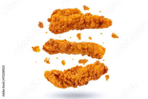 Fried chicken breast strips on white background. Isolated chicken crisps