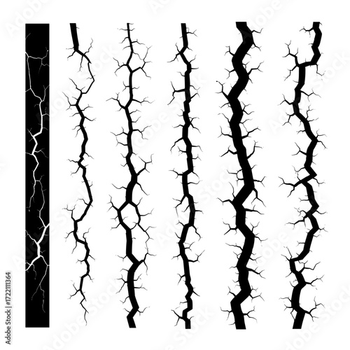A collection of different sizes and shapes of cracks that appear on surfaces.