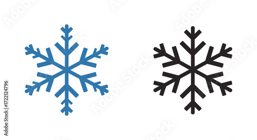 Two detailed snowflake illustrations one blue and one black side by side
