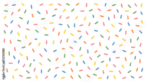 Flat lay photograph of colorful sprinkles on a white background