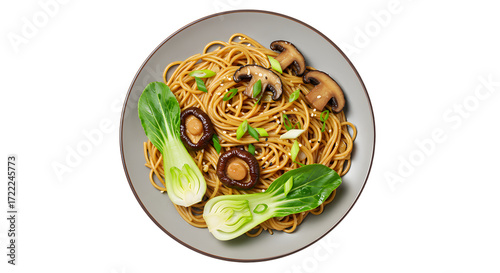 Delicious plate of Asian stir-fried noodles with mushrooms and bok choy on grey ceramic dish, perfect for healthy lunch or dinner ideas