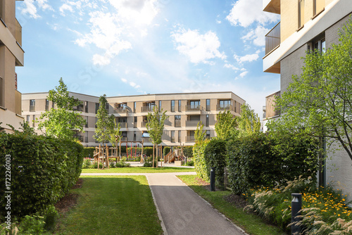 Residential area with ecological and sustainable green residential buildings, low-energy houses with modern apartments, new green urban landscape in the city