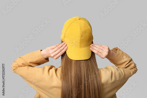 Young woman in stylish yell...