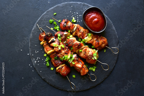Grilled chicken kebab skewers . Top view with copy space.