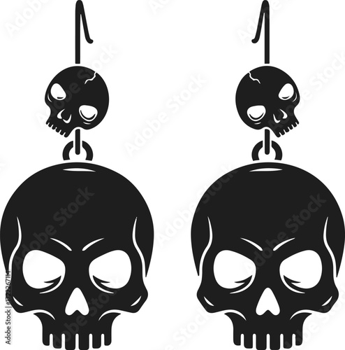 Close-up view of a pair of black skull dangle earrings. Each earring features a small skull charm hanging from a larger skull-shaped pendant. The skulls are detailed with eye sockets, nasal cavity, an