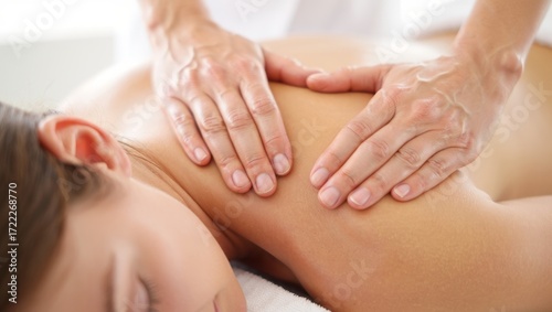 Wallpaper Mural Woman receiving a deep tissue back and shoulder massage from therapist hands, experiencing relaxation and therapeutic benefits at a tranquil spa or wellness center Torontodigital.ca