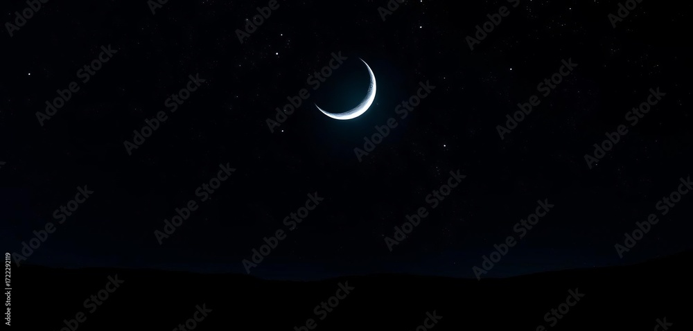 Naklejka premium Silvery crescent moon hangs low over a dark, star-studded landscape, night scene, peaceful