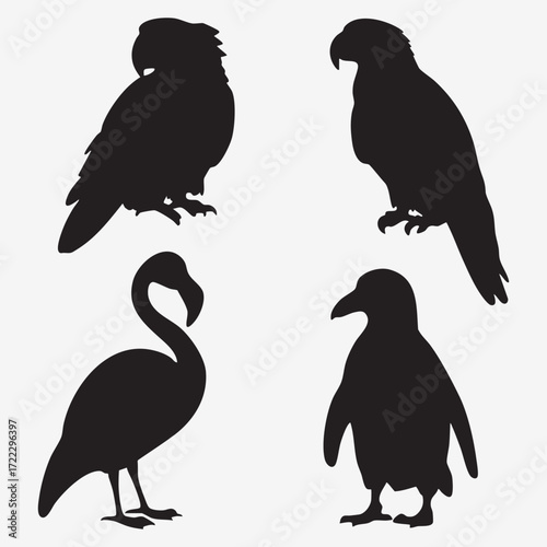 A set of flying bird silhouettes, including an eagle, owl, and raven, perfect for nature and wildlife vector illustrations