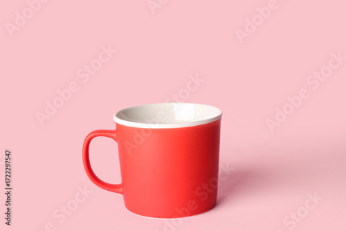 Red ceramic coffee mug with...
