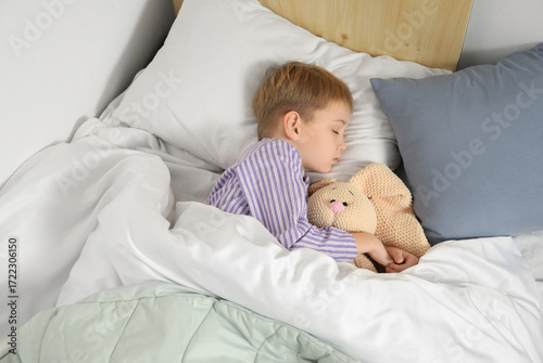 Cute little boy with knitte...