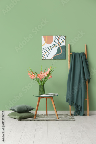Stepladder, table and vase ...