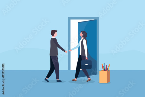Business handshake at the doorway with a woman carrying a briefcase and a man in a suit