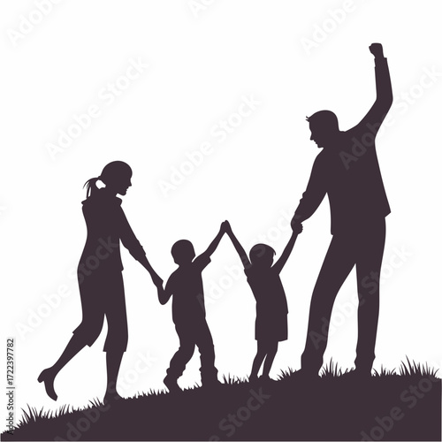 Joyful family silhouette with mother father and two children holding hands and celebrating outdoors on grass