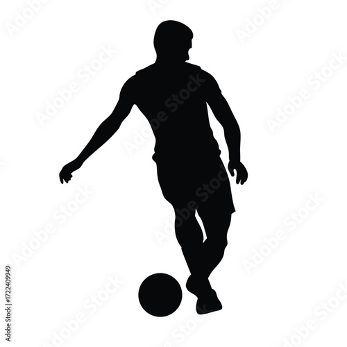 Silhouette of a soccer player dribbling a ball on a white background