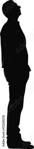 A solitary silhouette of a person standing in a thoughtful pose