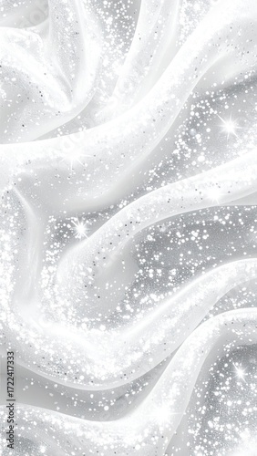 Flowing white fabric with shimmering specks creating a soft, luminous texture, evoking elegance and ethereal beauty