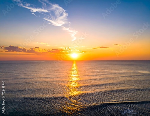 Sunrise over calm ocean