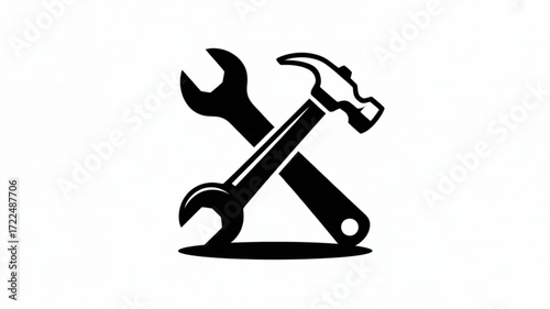 Black and white illustration of crossed hammer and wrench tools, suitable for construction, repair, or handyman themes