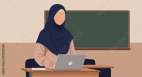 Muslim Teacher in Classroom with Chalkboard and Laptop