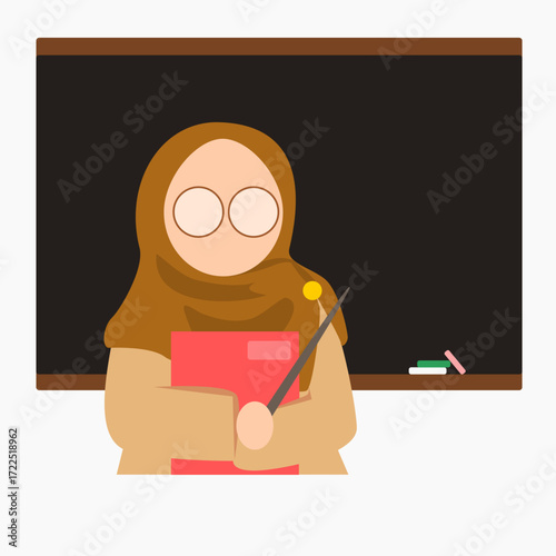 Indonesian female teacher wear uniform and hijab holding a book, standing in front of the blackboard