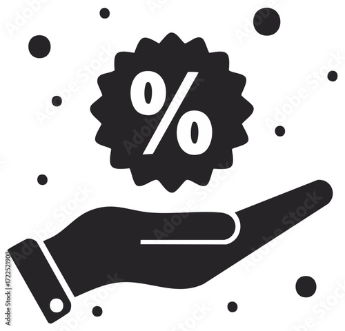 Hand holds discount percentage symbol with scattered dots representing falling prices or savings