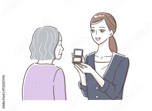 シニアの女性に化粧品を紹介するビューティーアドバイザーのイラスト素材