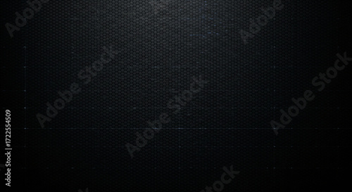 Dark textured carbon fiber weave pattern with subtle blue grid lines for futuristic tech backgrounds