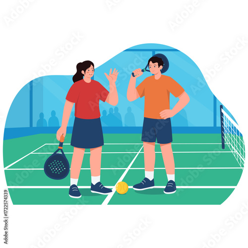Two people playing tennis on a court