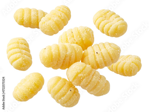Fresh uncooked gnocchi pasta isolated, showing classic ridged texture, handmade appearance, and dusted with flour on a white background.