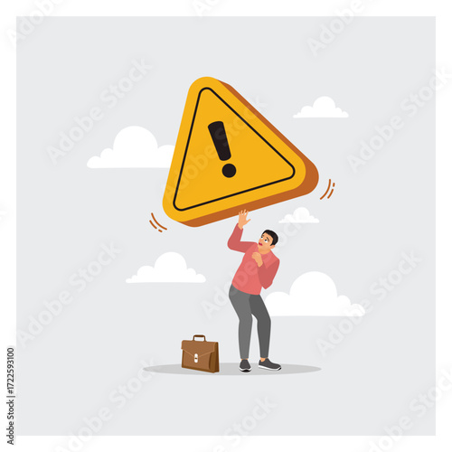 Challenge to Success Concept. Man Struggling With a Giant Warning Sign for Mistake Attention.