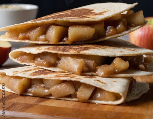 cinnamon apple quesadillas on a wooden board