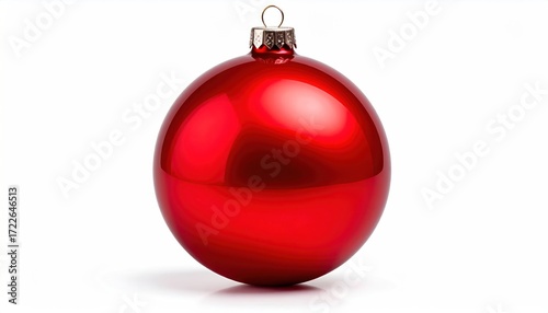 A shiny, red spherical Christmas ornament with a metal loop on top, casting a soft shadow on a plain white background